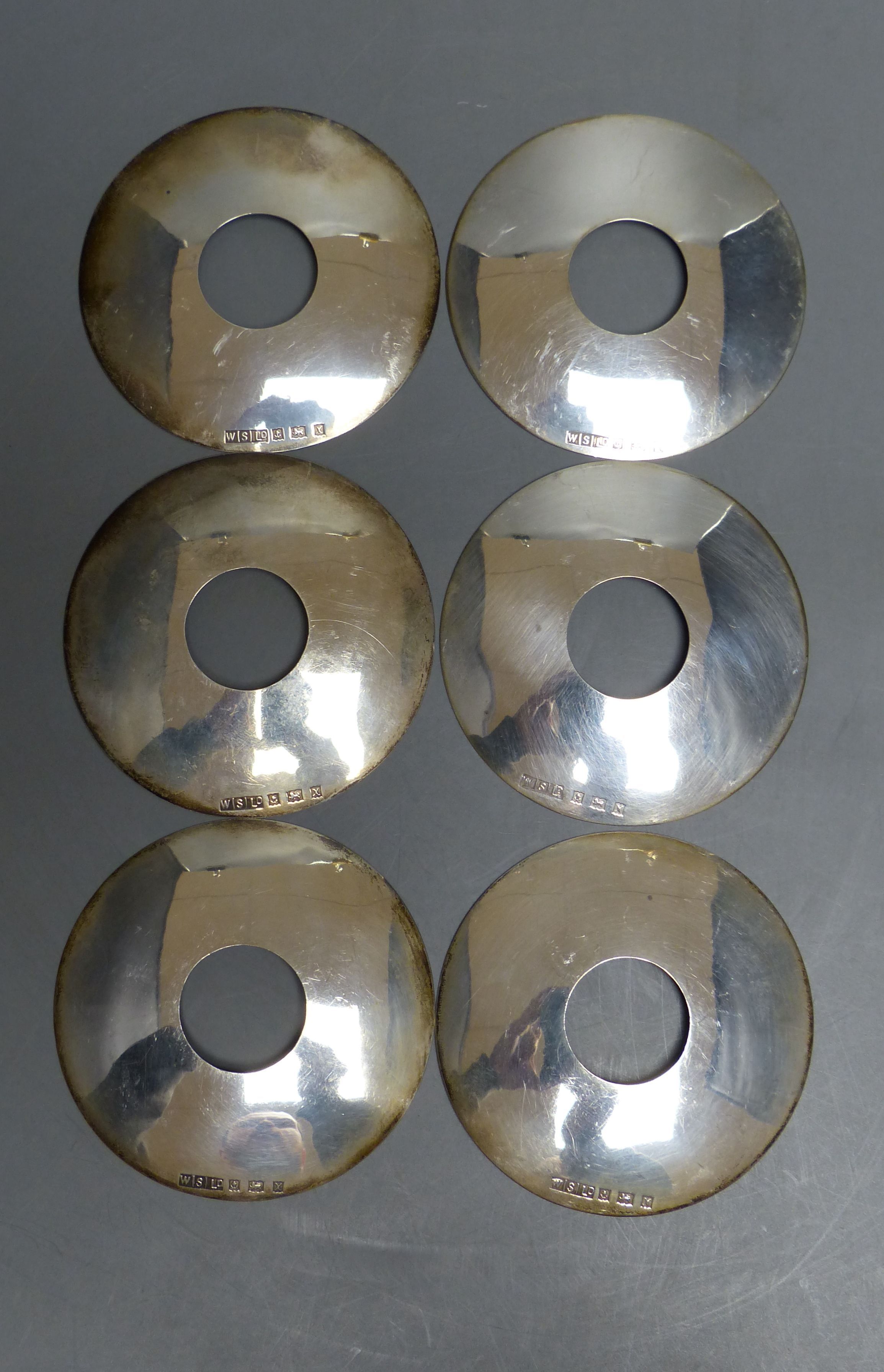 A set of six modern silver drip pan dishes, 76mm, 5oz.